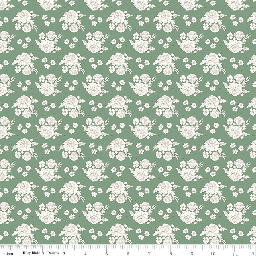 White floral pattern on a green background