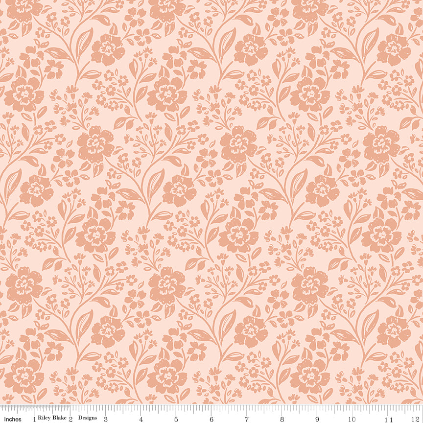 Floral pattern fabric swatch on a pink background