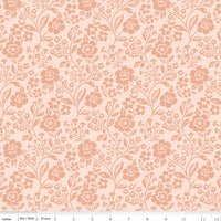 Floral pattern fabric swatch on a pink background