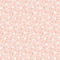Pattern of small white flowers on a pink background