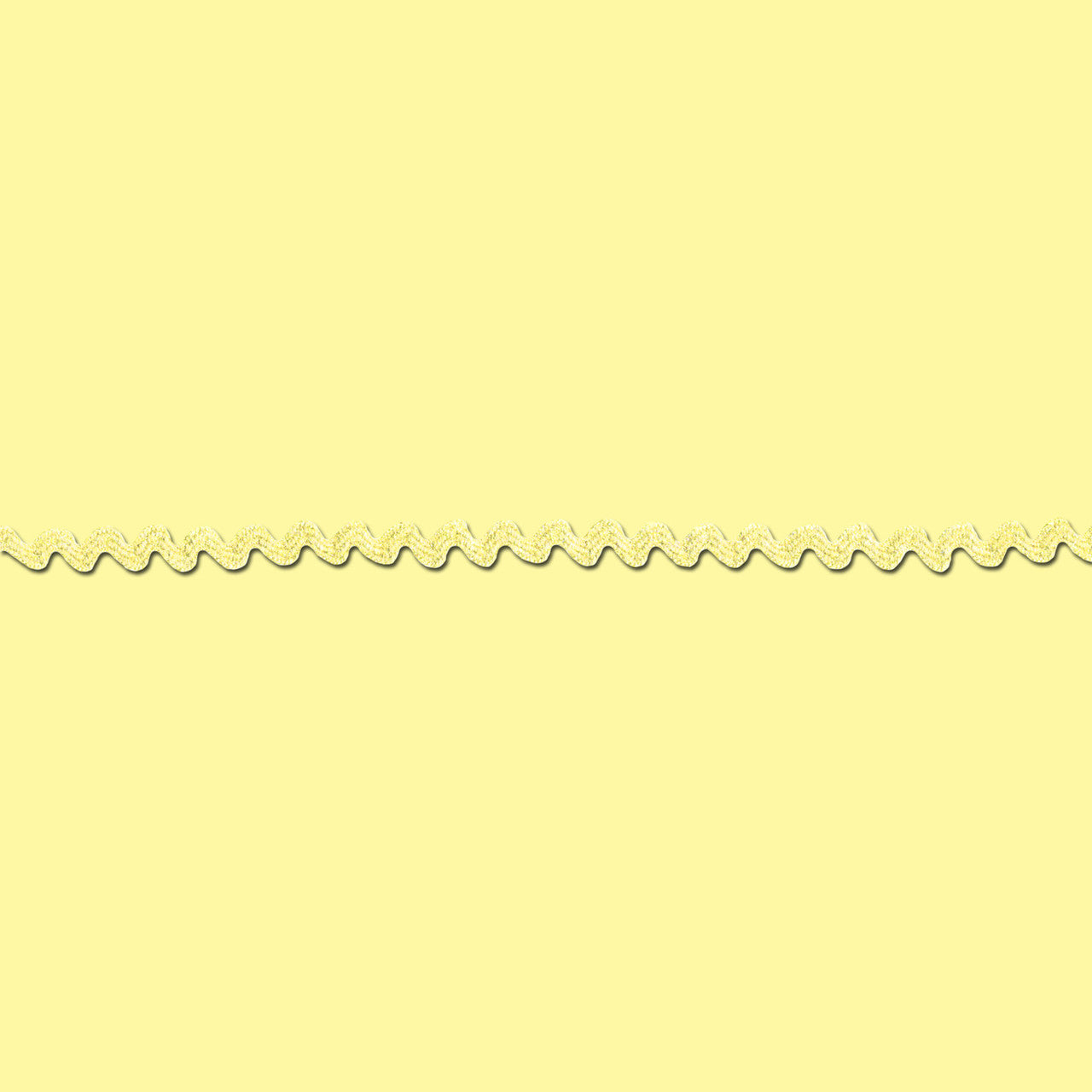 Decorative yellow baby rick rack on a light yellow background
