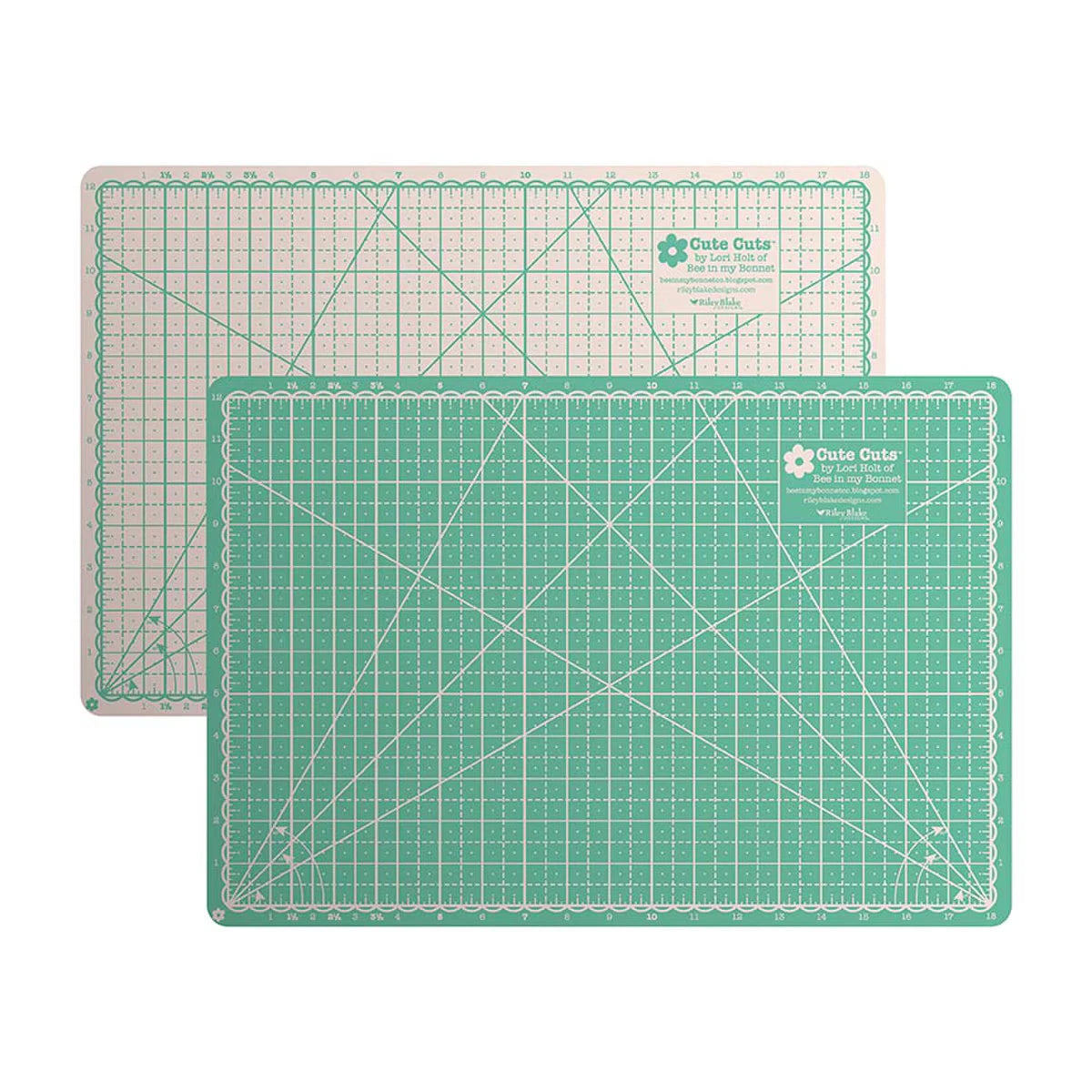 Two cutting mats with grid lines on a white background